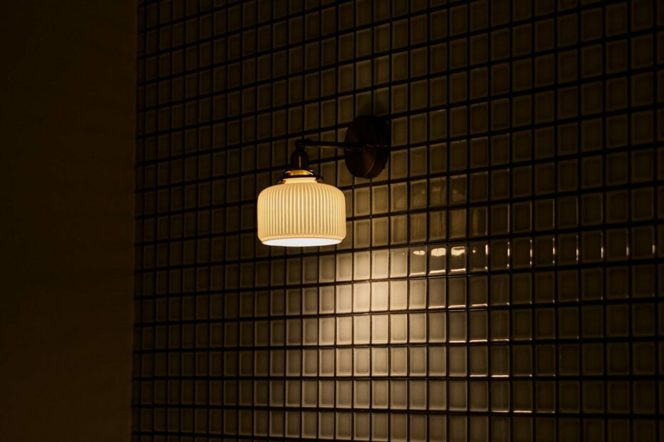 white pendant lamp turned on in room